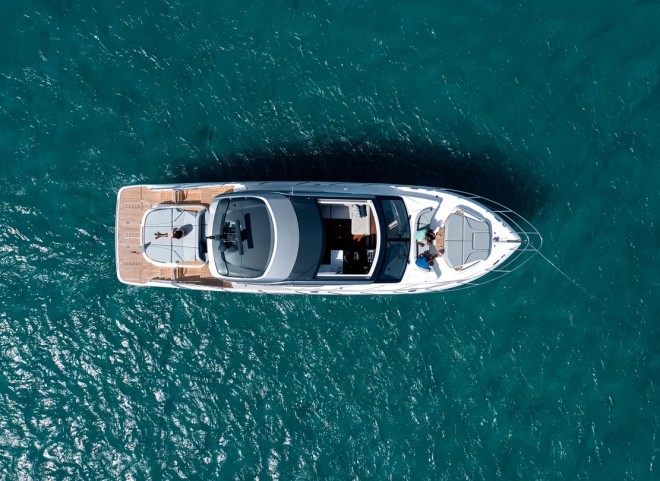 Elegant Princess Yacht sailing on the open sea, showcasing its sleek design and luxurious features