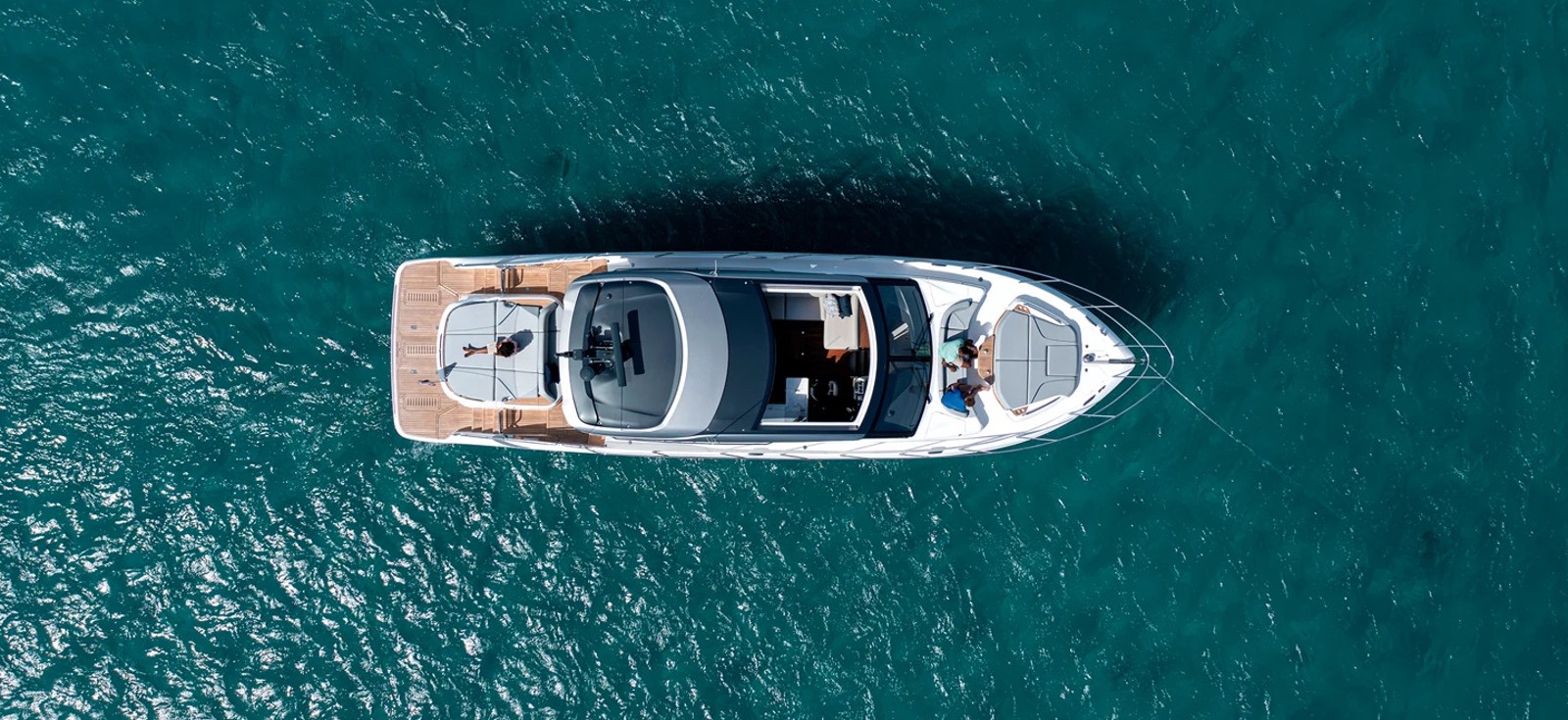 Elegant Princess Yacht sailing on the open sea, showcasing its sleek design and luxurious features